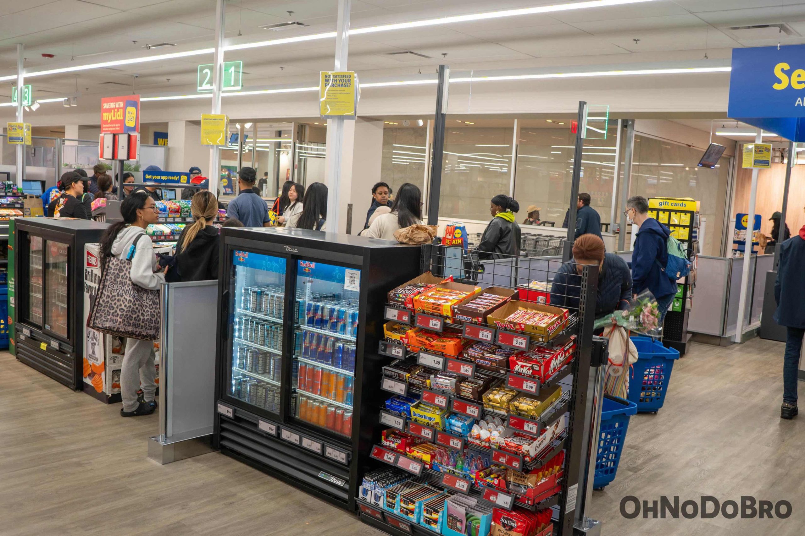 Standard checkout registers at Lidl. Customers are paying for their groceries