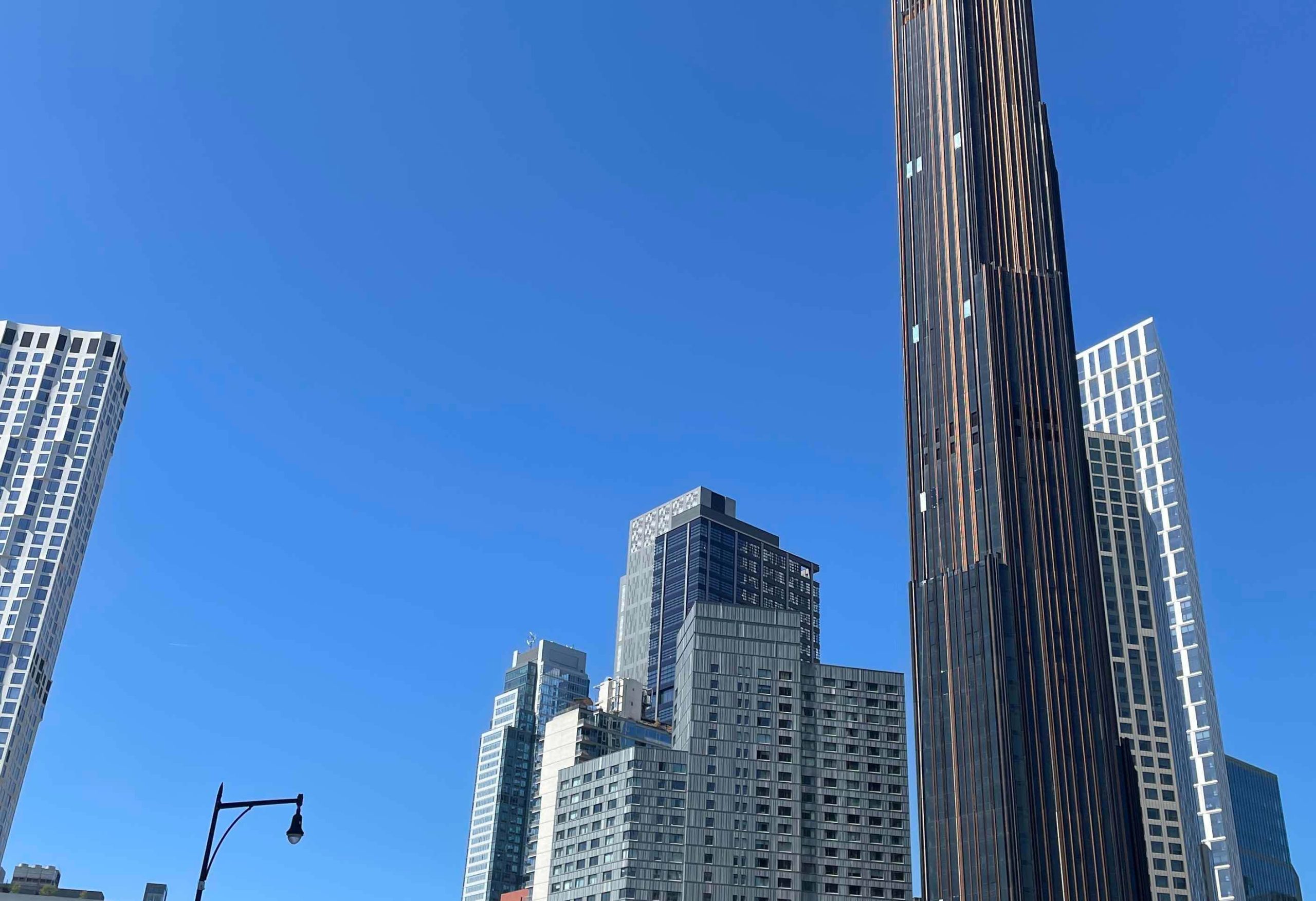 Sky photo of Downtown Brooklyn, with various skyscrapers poking up, including City Point and 9 Dekalb